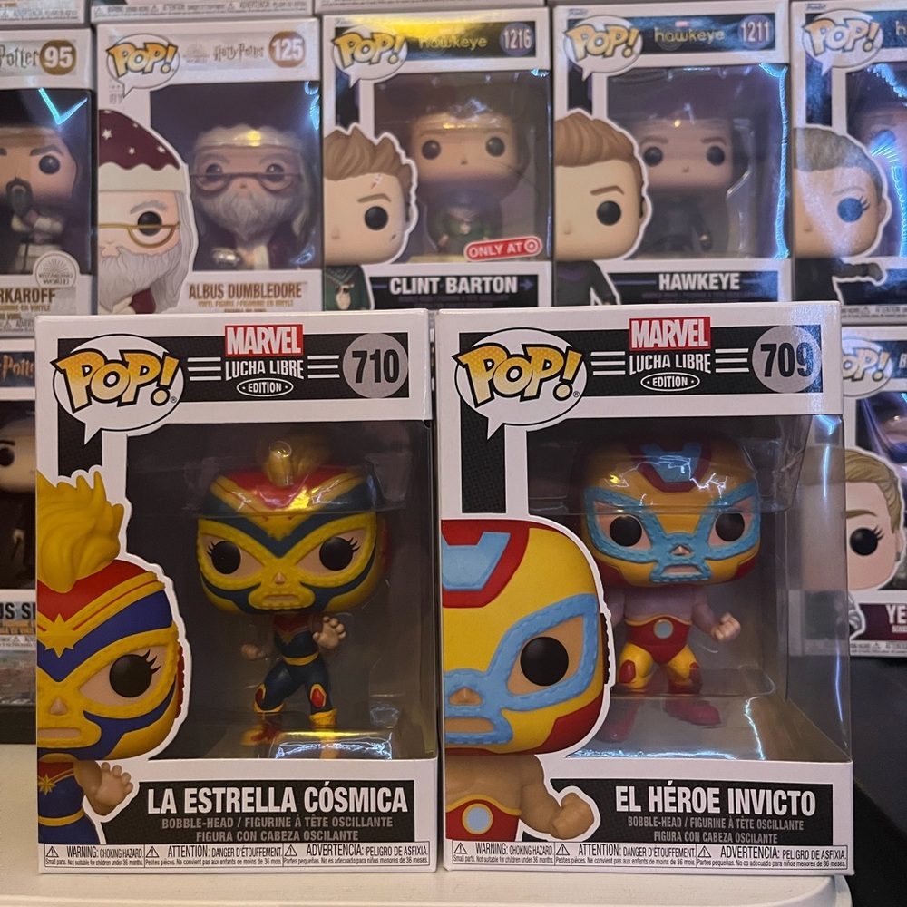 La Estrella Cósmica & El Héroe Invicto Funko Pops